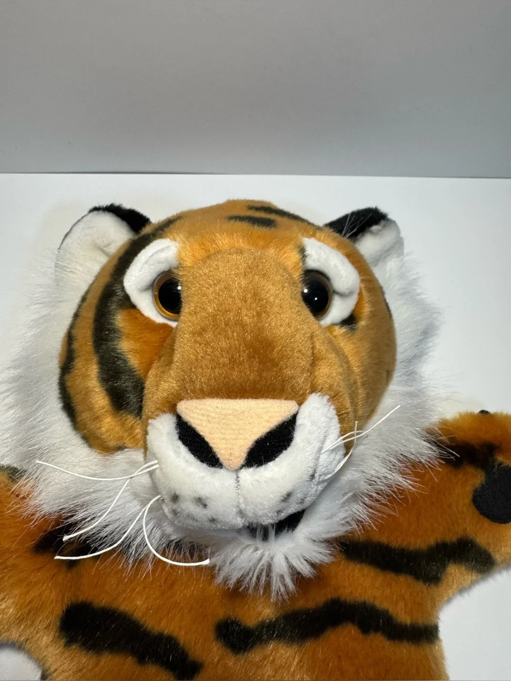 The Puppet Company Long Sleeve Tiger Puppet 15” orange and black.